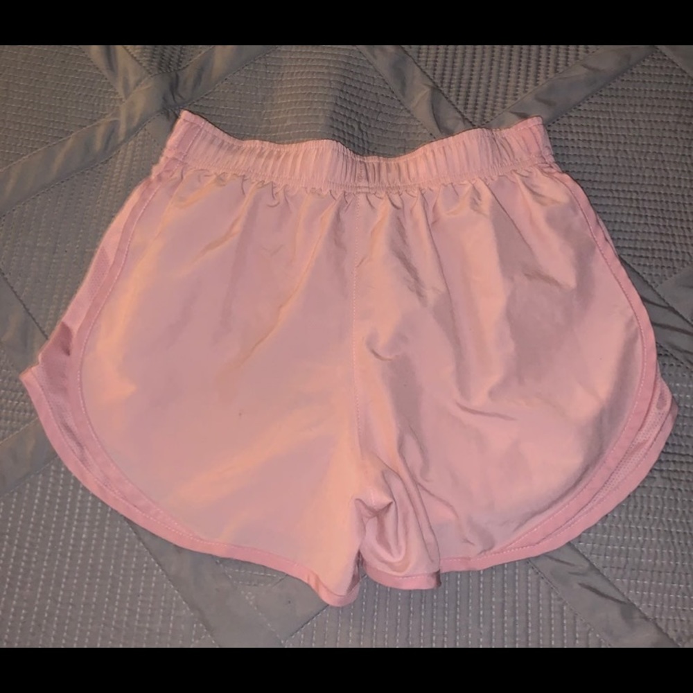 Pink Nike shorts